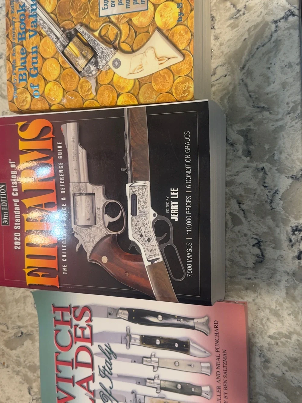 Firearms Reference Guide Book - Brown and Silver guns knive book